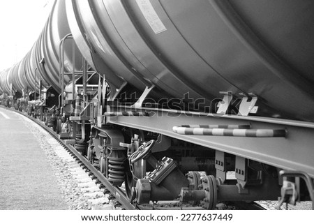 Black and white recording of rails, rail traffic, railroad tracks with train excerpts

