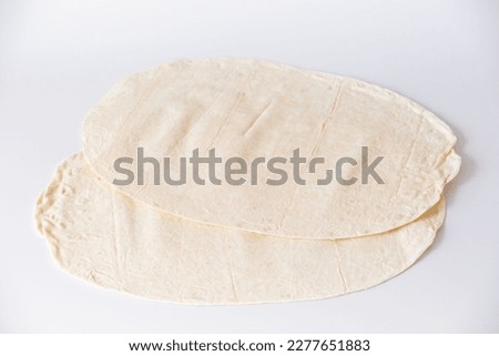 two pita bread on a white background