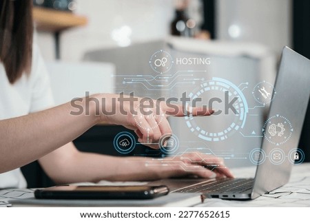 Woman using computer, tablet and presses his finger on the virtual screen inscription Hosting on desk, Web hosting concept, Internet, business, digital technology concept.
