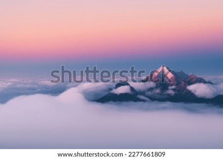sunrise over the mountains over the clouds