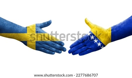 Handshake between Bosnia and Sweden flags painted on hands, isolated transparent image.