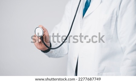 As a medical professional, physician in hospital clinic relied on their stethoscope, extensive knowledge of medicine to provide high-quality health care to their patients. Doctor working in hospital