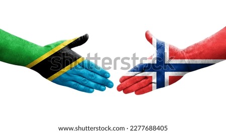 Handshake between Norway and Tanzania flags painted on hands, isolated transparent image.
