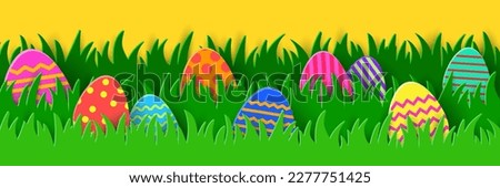 Easter banner with painted eggs in the spring grass. Paper cut style decoration. Panoramic header. Vector illustration