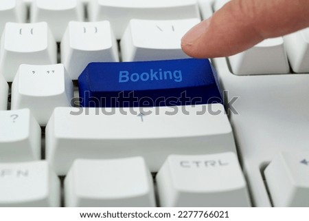 Modern keyboard with booking button