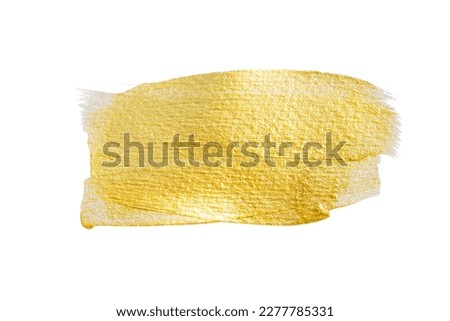 Golden paint brush stroke. isolated on white with glittering texture. clipping path