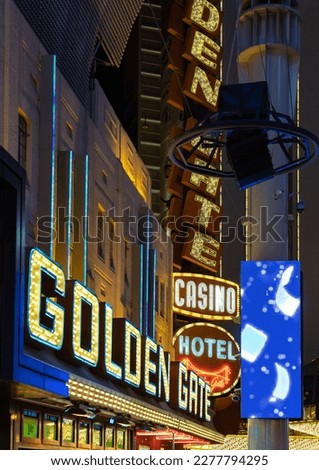 A picture of the neon signs at the Golden Gate Hotel and Casino.