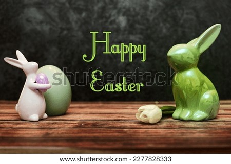 Happy Easter. Congratulatory easter background. Easter bunnys egg and flower