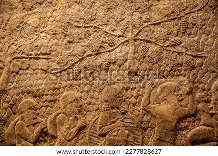 Jews exiled to Mesopotamia in the aftermath of the Assyrian victory over Judah during the siege of Lachish (701 BCE), from the Lachish reliefs, Assyrian Palace Art from Nineveh, British Museum Royalty-Free Stock Photo #2277828627