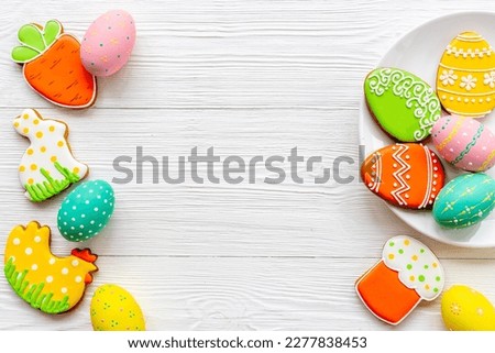 Easter cookies eggs and bunny on plate. Happy Easter background.