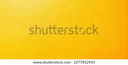 The​ pattern​ of​ surface​ wall​ concrete​ for​ background. Abstract​ of​ surface​ wall​ concrete​ for​ vintage​ background. Yellow​ wall​ texture​ for​ vintage​ background. Grunge​d​ wall​ texture.