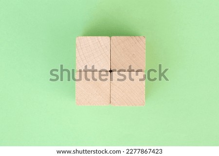 A studio photo of small wooden blocks