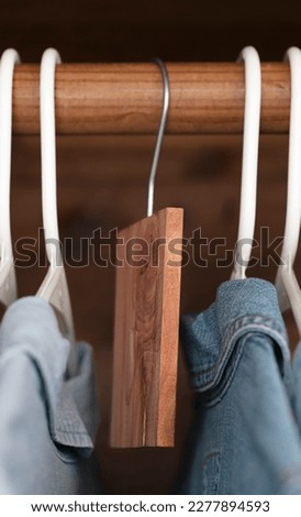 Aromatic cedar block hanging in a closet. Royalty-Free Stock Photo #2277894593