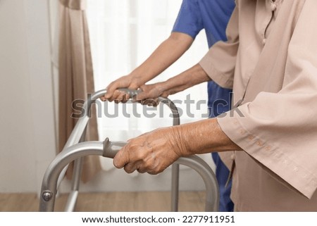 Caregiver takecare old woman that having Sarcopenia or muscle loss. Sarcopenia is a degenerative disease of the muscle usually caused by the natural consequence of aging. Royalty-Free Stock Photo #2277911951
