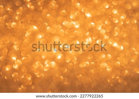 Orange bokeh and defocused background with copy space