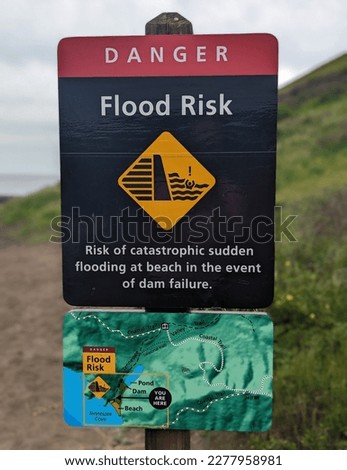 danger flood risk caution sign post at Tennessee Valley Trail