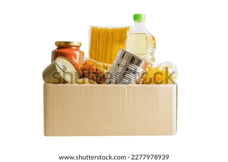 Foodstuffs in donation box isolated on white background with clipping path for volunteer to help people. Royalty-Free Stock Photo #2277978939