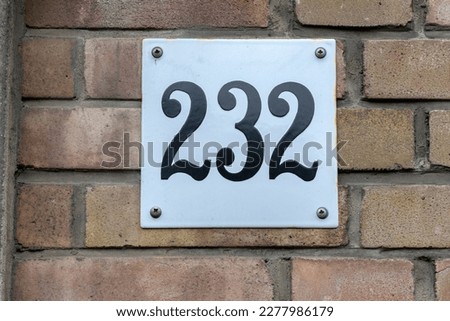 A Close Up House Number 232   Royalty-Free Stock Photo #2277986179