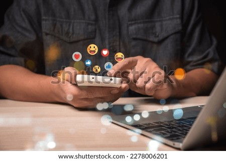 Social media and digital online concept, man using smart phone with Social media. The concept of living on vacation and playing social media. Social Distancing ,Working From Home concept