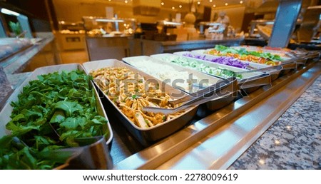 Salad, vegetables bar on self-service luxury hotel in Tunisia. All-you-can-eat buffet during lunch, dinner time. Choose dishes. Resort restaurant. All inclusive. Buffet food. Self-service restaurant. Royalty-Free Stock Photo #2278009619