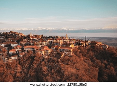 Love city Sighnaghi aerial view with caucasus mountain blank space background. Travel destination Georgia