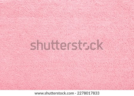 Light pink dry soft microfiber rag background. Closeup. Pastel color. Empty place for text.