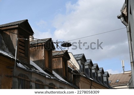 pitched roofs of the old town with voluminous skylights