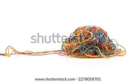 Tangled colorful cotton threads isolated on white background. Pile of knitting yarn threads. Royalty-Free Stock Photo #2278058701