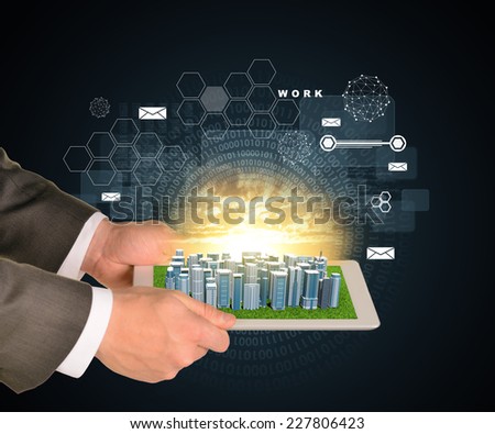 Man hands using tablet pc. Business city on touch screen. Figures as backdrop.  Business concept