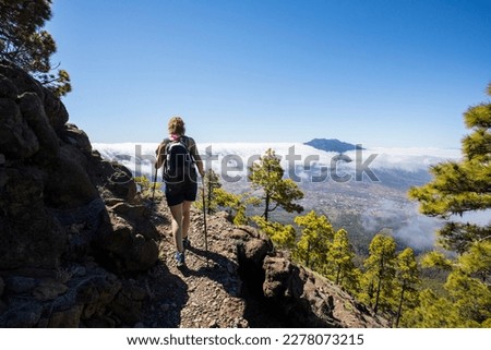 Young woman summit to Bejenado Peak in Caldera De Taburiente, La Palma, Canary Islands, Spain Royalty-Free Stock Photo #2278073215