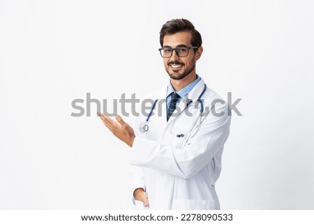 Man portrait of a doctor wearing a white coat and eyeglasses and a stethoscope looking into the camera on a white isolated background, copy space, space for text, health Royalty-Free Stock Photo #2278090533