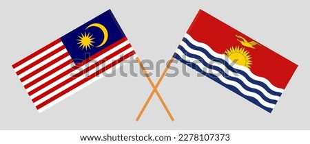 Crossed flags of Malaysia and Kiribati. Official colors. Correct proportion. Vector illustration