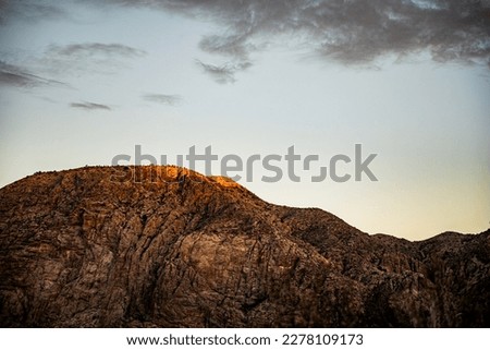 Morning Light Hits The Tip of the Western Chisos Mountains in Big Bend National Park Royalty-Free Stock Photo #2278109173