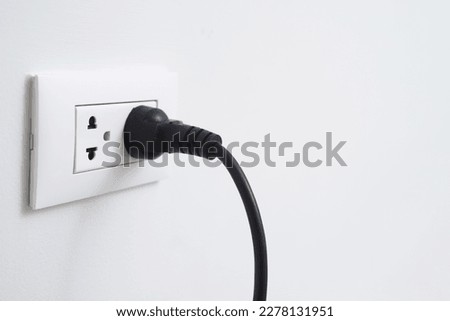 Close Up the electrical power socket and plug socket on wall. Royalty-Free Stock Photo #2278131951
