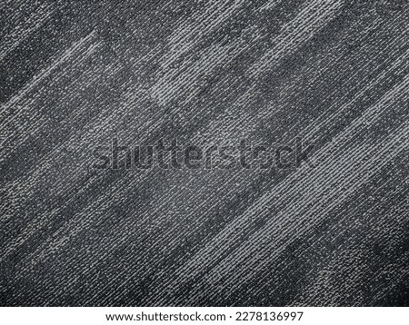 stock photo of a gray-colored, shaded diagonal stripe nylon cut pile textured carpet background. Picture captured at IT company office, Hyderabad, telangana, India. Royalty-Free Stock Photo #2278136997