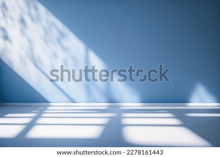 Light blue empty wall and smooth floor with interesting light glare. Background for the presentation. Royalty-Free Stock Photo #2278161443