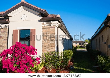Close up details of home exterior in South Florida golf and retirement community. Royalty-Free Stock Photo #2278173853