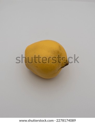 Close-up of an quince isolated white background.