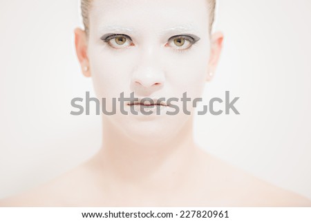 Portrait of a young woman with a futuristic look.