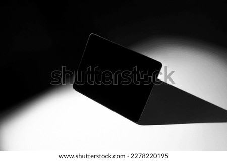Tablet computer mockup template, with deep shadows, real photo. Blank isolated to place your design.