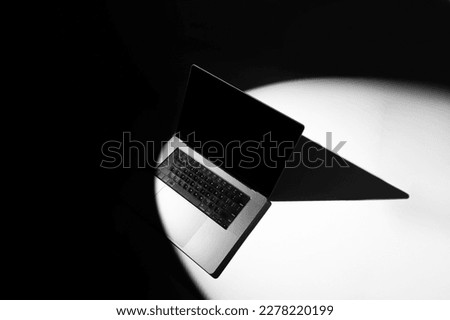 Laptop mockup template with deep shadows, real photo. Blank isolated to place your design.	