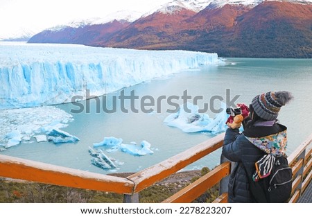 Female Visitor Shooting Photos of Perito Moreno Glacier, an Incredible UNESCO World Heritage Site in Patagonia, Argentina, South America