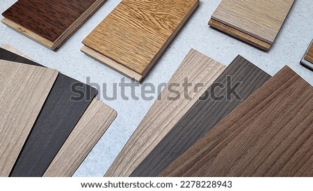 variety of wood texture for furniture and flooring furnishing material samples. interior material design samples in close up view. laminated, veneer, engineering wood flooring samples. Royalty-Free Stock Photo #2278228943