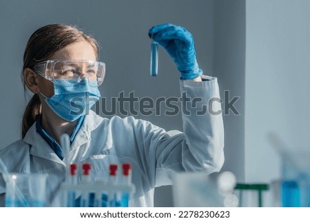 Medical research laboratory. A scientist works with a pipette and a test tube. Scientific laboratory of biotechnology, development of medicine and research in chemistry, biochemistry and experiments. Royalty-Free Stock Photo #2278230623