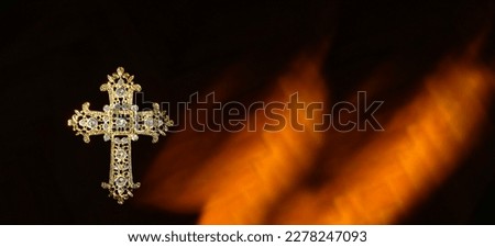 openwork decorated beautiful christian cross with rhinestones isolated on abstract dark background close up. Cross - symbol of prayer, memory, Lent, Easter, Faith in God. element for design. banner