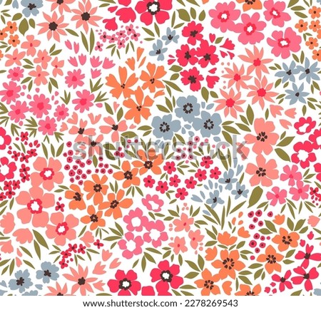 Beautiful floral pattern in small abstract flowers. Small colorful flowers. White background. Ditsy print. Floral seamless background. Vintage template for fashion prints. Stock pattern. Royalty-Free Stock Photo #2278269543