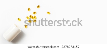 Vitamin omega 3 capsulespills pills fish on a white background. Top view, flat lay. Banner. Royalty-Free Stock Photo #2278273159