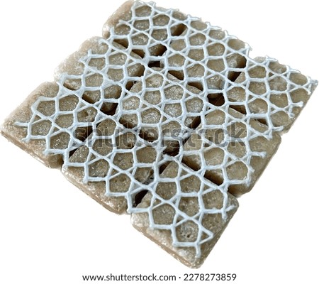 Mesh backing of real stone mosaic crafted for good adhesion to cement surfaces used in architectural wall and floor applications.
