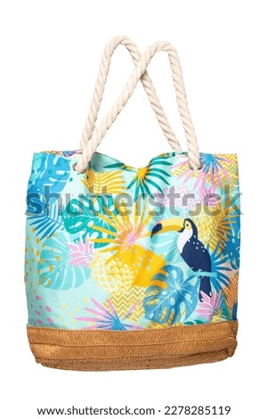 Colorful beach bag isolated on a white background. Clipping path. Summer holidays, vacation and travel concept. Beach handbag for travel.