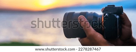 photographer takes photo on the mountain
